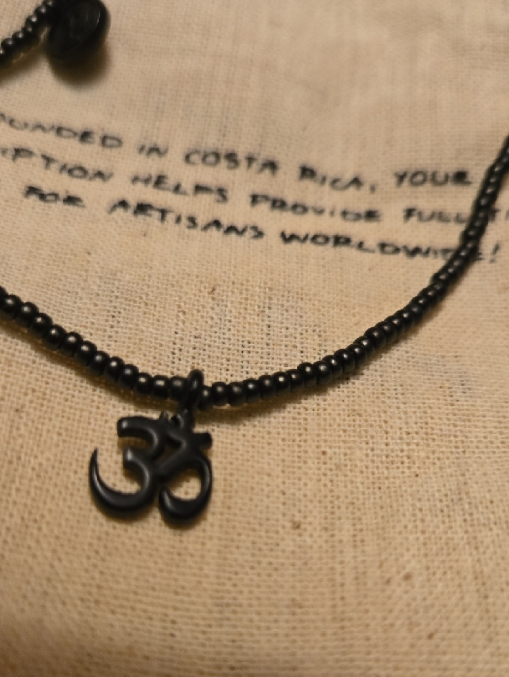 Black Beaded Bracelet with Ohm Charm - Picture 3 of 4